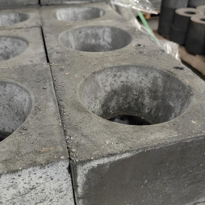 Bloc réfractaire de puits de récipient de distribution pour la coulée continue